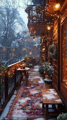 an outdoor deck covered in christmas lights and decorations