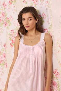 A clean and classic look, this 100% cotton nightgown is designed with a delicate dobby stripe, accented by venise lace at the straps and skirt, pintucks, and a placket of akoya shell buttons. Style Number: E5520079-100 Length: 49 ½" 100% Cotton Dobby Stripe WovenExclusive of ornamentation Model is wearing size S. She is 5'8", Bust 32", Waist 24", Hips 34" Imported Free Nightgown Patterns For Women Cotton, Rose Gown, Eileen West, Cotton Gowns, Night Gowns, Sleepwear Fashion, Cotton Nightgown, The Madison, Shell Buttons