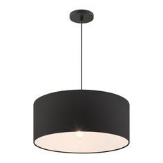 a black and white light fixture with a circular shade hanging from it's ceiling