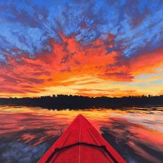 a painting of a red canoe in front of a sunset over the water with clouds