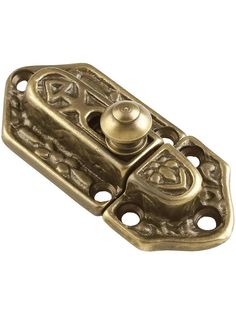 an antique brass plated door hinge with a decorative design on the front and side