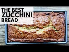 a loaf of zucchini bread sitting on top of a wooden table with the words, the best zucchini bread