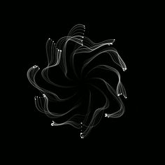 an abstract black and white photo with lines in the shape of a flower on a dark background