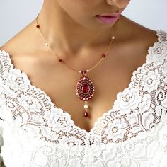 "I created this red teardrop earring by hand, using Swarovski teardrop 18*13mm for each one, Swarovski 3mm pearls, Swarovski drop, Miyuki round seed beads, Miyuki Delica beads, and 14k goldfilled ear-wire Victorian style, feminine and Impressive * Measurements: Earring length: 1.96\" (5cm) Pendant diameter: 0.59\" (1.5cm) * The earrings will come beautifully packaged for a gift. *Additional information on the matching necklace you can see here: https://www.etsy.com/listing/217444296/red-crystal- Long Chain Earrings Gold, Red Pendant Necklace, Burgundy Earrings, Victorian Style Earrings, Red Crystal Necklace, Swarovski Crystal Drop Earrings, Victorian Earrings, Victorian Necklace, Beaded Earring