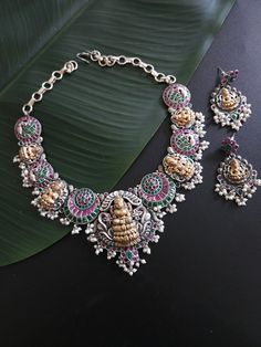 Antique silver replica necklace in Contemporary Look. Fusion Jewellery. Most demanding and liked necklace with beautiful color. Traditional Indian jewelry necklace. Add charm and charisma to your beautiful personality with these stunningly handcrafted silver look alike pendand necklace . Wear it with any of your formal or casual outfits and grab compliments all the way! Silver Dual-tone Kundan Necklace In Temple Jewelry Style, Silver Dual-tone Kundan Necklace Temple Jewelry, Silver Dual-tone Chandbali Temple Necklace, Silver Dual-tone Temple Kundan Necklace, Silver Dual-tone Temple Necklace Pendant, Silver Dual-tone Pendant Temple Necklace, Silver Dual-tone Chandbali Necklace, Silver Dual-tone Temple Jewelry Necklace, Silver Dual-tone Temple Necklace As Gift