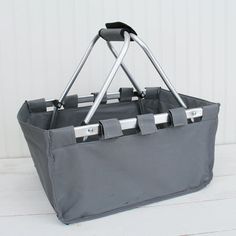 a large gray shopping bag with two handles