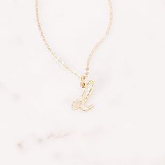 Understated and chic, the Nella Mini Initial Pendant lets you wear your initial or the initial of someone you love with a lowercase letter charm that can be worn on its own or layered with other pieces. Available in sterling silver, 18k gold plated or 18k rose gold plated silver Size: 1/4 to 1/2" (varies by letter) 16" cable chain with 2" extender Spring ring closure Made in the USA This is a lowercase only font, uppercase letters entered will be produced as lowercase This item is FINAL SALE and Silver 14k Gold Initial Necklace With Charms, Dainty Initial Necklace With Charms For Personalized Gift, Gold Classic Initial Necklace With Charms, White Gold Monogram Initial Pendant Jewelry, Minimalist Initial Necklace With Charms For Personalized Gift, Minimalist Charms Initial Necklace For Personalized Gift, Minimalist Initial Necklace With Charms As Personalized Gift, Rose Gold Charm Necklace With Initial Pendant, White Gold Initial Pendant Charm Necklace Tarnish Resistant