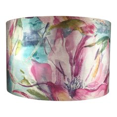 a lamp shade with flowers painted on it