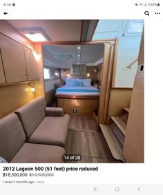 the interior of an rv with couches and storage space on each side is shown