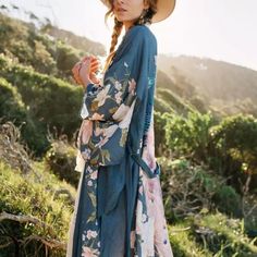 Gorgeous Blue Floral Long Maxi Kimono Duster Robe With Peacock Design On The Backside. Comes With Matching Sash Tie. Side Slits. Open Underarm Kimono Sleeves. Similar To Spell & Gypsy. Gorgeous Blue Floral Long Maxi Kimono Duster Robe With Peacock Design On The Backside. Comes With Matching Sash Tie. Side Slits. Open Underarm Kimono Sleeves. Similar To Spell & Gypsy. Bohemian Printed Kimono For Brunch, Flowy Bohemian Kimono For Brunch, Bohemian Wrap Kimono For Brunch, Spring Bohemian Maxi Kimono, Spring Boho Print Maxi Kimono, Spring Boho Print Maxi Length Kimono, Bohemian Long Kimono For Brunch, Bohemian Long Sleeve Kimono For Brunch, Blue Boho Print Kimono For Spring