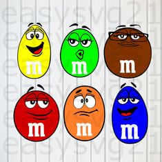 four different colored cartoon faces with the letter m