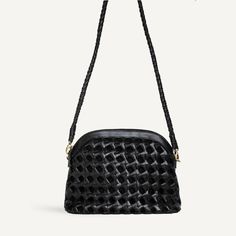 An oh-so-chic day bag (and the one our founder wears daily!). In a buttery soft, knotted woven leather with an arched top shape. Don’t be fooled by the size, Carmen is surprisingly roomy. Wear it long on your shoulder, crossbody, or tie the long strap into a knot and watch it transform into something new.   The Woven C Evening Satchel With Braided Handles Crossbody, Versatile Evening Shoulder Bag With Braided Handles, Evening Pouch Shoulder Bag With Intrecciato Weave, Leather Top Handle Shoulder Bag With Braided Detail, Elegant Woven Crossbody Shoulder Bag, Braided Leather Top Handle Shoulder Bag, Evening Woven Leather Bucket Shoulder Bag, Chic Evening Satchel With Woven Leather, Chic Woven Leather Evening Shoulder Bag