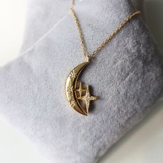 Collection : '' I see lots of stars but none of them is you'' 925 sterling silver 14K Gold Weight for 925 Silver : 4,85 gr (approximate) Weight for 14K Gold : 6.09 gr (approximate) FREE Fedex Express Shipping 2-7 business days to Worldwide ✦ Registered mail which require a signature ✦ We need your phone number for Fedex/TNT receipts. ✦ We can't send to PO BOX adresses. Celestial Hallmarked Necklaces For Anniversary, Celestial Style Hallmarked Necklaces For Anniversary, Engraved Star-shaped Yellow Gold Necklace, Engraved Star Yellow Gold Necklace, Celestial Sterling Silver Necklaces In Gold, Celestial Gold Sterling Silver Necklaces, Luxury Gold Star Necklace, Gold Star Necklace For Anniversary, Diamond Moon Necklace