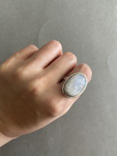 Natural White Simple Style Moonstone Oval Ring - Sterling Silver ★ Quantity : One Ring ★ Color : Silver ★ Material : Sterling Silver ★ Gemstone: Moonstone ★ Ring Size : 6 / 7 / 8 / 9 ★ Band Size : 4mm wide and 1.5mm thick ★ Oval Size : about 25mm * about 15mm ★ Comes in a jewelry box. If you need extra boxes for gifting....just let us know! Eye Ring Silver, Thick Ring, Silver Eye, Oval Rings, Eye Ring, Silver Prices, Moonstone Ring, One Ring, Chain Ring