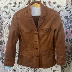 Mossimo Genuine Leather Jacket Vintage Leather Blazer Outer Jacket Lines Are Distressing Is Natural Or Caused By Normal Wear No Other Flaws Fully Lined Save $10 On Your First Purchase If You Sign Up With Code Takese7en Check Out The Rest Of Our Closet For Discounts! We Do Our Best To Note All Flaws. Garments Hand Picked By Takese7en. Vintage Items May Have Some Discoloring, Fading, Pulling Or Other Flaws Not Mentioned. Items Sold May Be Pre-Loved Washed And/ Or Clean Unless Stated New With Tags. Fitted Cognac Outerwear For Work, Brown Leather Jacket With Pockets For Work, Cognac Leather Jacket For Work, Classic Cognac Outerwear For Work, Cognac Long Sleeve Outerwear For Work, Fitted Beige Leather Jacket With Pockets, Camo Puffer Jacket, Leather Jacket Vintage, Windbreaker Jacket Mens