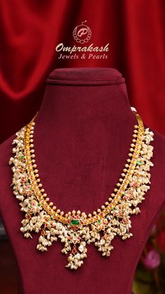 Unveil the beauty of heritage with our Guttapusalu necklace and earrings set, crafted for the modern connoisseur.  Product Code: OPJ 1196  To know more dm, whatsapp or contact us on +91 90009 09011  #gold #goldnecklace #guttapusalu #necklace #goldjewellery #kundan #gemstones #southindianjewellery #southjewellers #bridaljewellery #ethnicjewellery #heritagejewellery #916kdmjewellery #bridesofinstagram #bridesofhyderabad #bridesofindia #bridesoftelugu #kundannecklace #bridaljewellery #southbrides Heritage Jewellery, South Indian Jewellery, Jewellery Earrings, Kundan Necklaces, Necklace And Earrings Set, Temple Jewellery