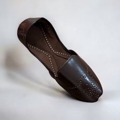 Elevate your fashion game and experience the epitome of comfort with our Pakistani Loafers Collection. Limited quantities available, so secure your pair today.  Our loafers provides exceptional comfort, featuring a soft leather interior that is draped in luxurious  velvet and equipped with an extremely soft sole. They are an excellent choice for various special occasions, such as weddings, birthdays, family gatherings, or any other special event. Our shoes are available in US sizes and are true Traditional Brown Leather Slip-ons, Traditional Leather Flat Loafers, Traditional Leather Loafers, Pakistani Shoes, Punjabi Fashion, Leather Slippers, Leather Gifts, Cut Work, Handmade Shoes