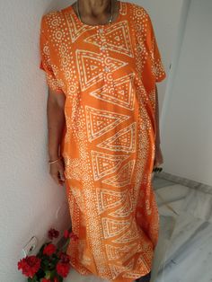 Orange cotton kaftan Long Printed Beach Dress For Beach Cover-up, Casual Maxi-length Kaftan For Vacation, Summer V-neck Thobe For Beach Cover-up, Bohemian Batik Print Kimono For Summer, Bohemian Batik Print Sarong For Vacation, Bohemian Long Kaftan For Beach Cover-up, Summer Bohemian Holiday Kaftan, Long Bohemian Kaftan For Vacation, Printed Free Size Beach Dress