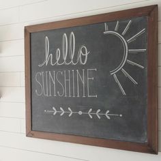 a chalkboard with the words hello sunshine written on it