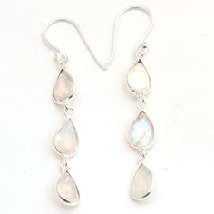 Faceted Moonstone Pear Shape Gemstone Long Earring - 925 Sterling Silver Handmade Women Drop & Dangle Earrings Jewelry length 2.2"- ae4600 ( Stamped 925 )MATERIAL -  925 STERLING SILVERGEMSTONE- MoonstoneSTONE SHAPE - Marquise, RoundEARRINGS LENGTH - 2.2"EARRING WEIGHT - 2.7 GRAMSSTONE SIZE - 8 x 6 MMCOLOR - White Silver Moonstone Earrings With Ear Wire, Silver Moonstone Dangle Crystal Earrings, Silver Dangle Moonstone Crystal Earrings, Handmade Silver Moonstone Crystal Earrings, White Moonstone Long Drop Earrings, Long Earring, Earrings Handmade Dangle, Moonstone Earrings, Stamped Jewelry