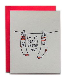 a card with two socks hanging on a clothesline that says i'm so glad i found you