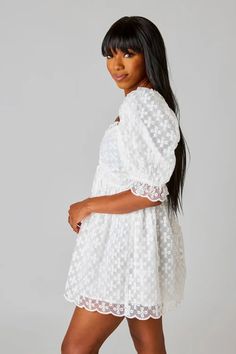 The Colby Dress features a drawstring in the front to adjust to your comfort, a slight puff sleeve, scalloped hem, and a smocked back to stretch around you. Fits true to size. *Available at our Rehoboth Beach location or Online Beach Location, Vegas Dresses, Babydoll Mini Dress, Rehoboth Beach, Cape Dress, Eyelet Dress, White Eyelet, Big Earrings, Colby