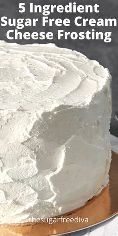 a white frosted cake with the words 5 ingredient sugar free cream cheese frosting