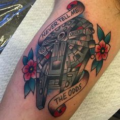 a close up of a person's arm with a tattoo on it that says never tell me the odds