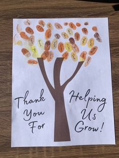 a handmade thank you card with an image of a tree and leaves on it