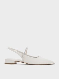 This item is part of our Online Exclusive selection, which consists of unique colourways and designs that are only available for purchase at CHARLESKEITH.COM. Feminine and chic, these slingback flats are a worthy addition to any wardrobe. The pristine white finish complement the sleek pointed-toed silhouette - this pair&rquos;s elegance is accentuated by dainty slingback straps. As an eye-catching detail, straps across the vamps are embellished with crystals for a glamorous touch. Set on low ... Chic White Ankle Strap Flats, Elegant Slingback Flats For Party, White Flat Slingback Pumps, Elegant Spring Slingback Flats, Elegant Flat Slingback Pumps With Heel Strap, White Flat Heel Slingback Pumps For Evening, Feminine White Slingback Pumps With Heel Strap, White Feminine Slingback Pumps With Heel Strap, Elegant Flat Slingback Sandals