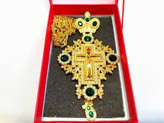 Pectoral cross with chain and green stones, orthodox priest gift cross and necklace with Jesus Crucifix, religious church gift for priest Length: 15cm or 5,9'' Made of high quality brass covered with gold paints. Can be a great gift for orthodox priest. PLEASE, PAY ATTENTION: check availability before order. Production time 2-4 weeks. Please, check the availability before the order. Standard delivery abroad takes 2-3 weeks. So if You need a product from our shop as a gift for a special event, please, be ready that the whole process will take minumum a month. Green Cross Pendant Necklace As Gift, Green Spiritual Cross Pendant Jewelry, Green Cross Necklace For Gift, Orthodox Priest, Pectoral Cross, Eastern Orthodox Church, Church Gifts, Eastern Orthodox, Green Stones