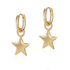 Take your style to the stars with our 'Super Star' earrings. The huggie hoop design ensures a comfortable and secure fit while the golden colour dangles elegantly in your ear. And with star charms that shine bright, these earrings will make you feel like a superstar. Use it as the base for a great Celeste Starre ear stack, and wear with 'The Starstuck' earrings and 'The Dorothy' cuff. 18k recycled gold plated earrings Huggie hoop with star charm Other materials include; brass Hoop Diameter: 1.2cm Hoop Width: 0.2cm Charm: 1.2cm x 1.6cm The island of Bali is the inspiration for the Endless Summer collection, reflecting the magic of the destination. This collection features a range of necklaces, bracelets, earrings, and rings, each one designed to evoke the spirit of the island and bring a to Golden Colour, Brass Hoops, Ear Stack, Hoop Design, Golden Star, Super Star, Christmas 2024, Recycled Gold, Bright Stars