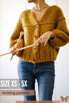 a woman wearing a yellow sweater and holding a knitting stick in her hand with the text size x - 5x