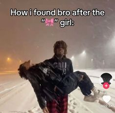 two people are standing in the snow with one person on his back, and the other is