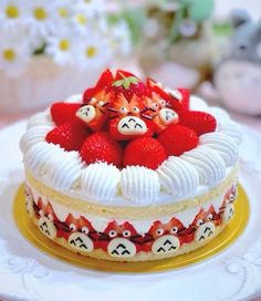 there is a cake with strawberries on top