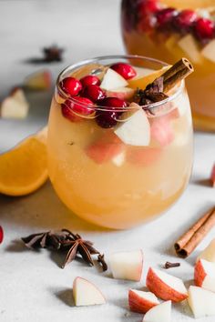 two glasses filled with apple cider punch