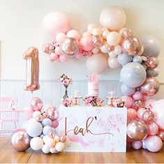 a birthday party with balloons and decorations