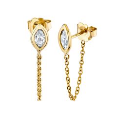 Experience unparalleled sophistication with our Bezel Shape Marquise Chain Hoop Earrings. Meticulously crafted, these earrings feature stunning marquise-shaped diamonds delicately encased in sleek bezel settings, suspending elegant chain hoops. Chain Hoop Earrings, Rose Gold Earrings, Bezel Setting, Hoop Earrings, Sleek, Diamonds, Yellow Gold, Rose Gold, Chain