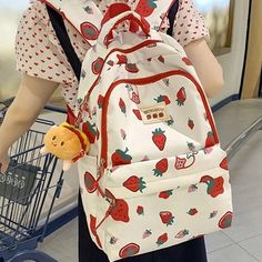 Get ready to strawberry your stuff with our White and Red Strawberry Print Backpack! This cute kawaii backpack adds a playful touch to your everyday carry while keeping your essentials organized. Perfect for anyone who loves a pop of red and some fruity fun in their life. Main Material: Nylon Lining Material: Polyester Bag Size: 31 * 14 * 44cm Keychain not included Preppy College, Kawaii Games, Kawaii Bags, Kawaii Backpack, Kawaii Pens, Cartoon Backpack, Pop Of Red, Bunny And Bear, College School