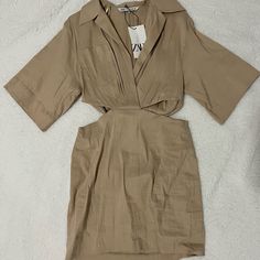 Brand New Zara Dress Size Medium Very Fashionable And Sexy. Khaki Spring Party Dress, Khaki Mini Summer Dresses, Summer Khaki V-neck Midi Dress, Summer Khaki Mini Dresses, Khaki Mini Length Summer Dress, Khaki Mini Dress For Summer, Chic Short Sleeve Cutout Dress, Chic Khaki Mini Dress, Beige Mini Dress For Spring Night Out