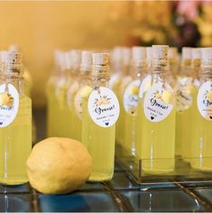 several bottles of lemonade sitting on top of a counter