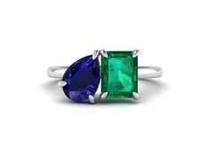 Toi Et Moi Ring Green Emerald and Blue Sapphire Diamond Ring Two Stone Engagement Ring 14K White Gold Ring Statement Ring Birthstone Ring ➠ 𝐌𝐨𝐢𝐬𝐬𝐚𝐧𝐢𝐭𝐞 𝐬𝐭𝐨𝐧𝐞 𝐢𝐬 𝐝𝐢𝐚𝐦𝐨𝐧𝐝'𝐬 𝐛𝐞𝐬𝐭 𝐚𝐥𝐭𝐞𝐫𝐧𝐚𝐭𝐢𝐯𝐞. 𝐖𝐞 𝐡𝐢𝐠𝐡𝐥𝐲 𝐫𝐞𝐜𝐨𝐦𝐦𝐞𝐧𝐝 𝐭𝐡𝐢𝐬 𝐨𝐩𝐭𝐢𝐨𝐧. ❆ 𝐂𝐞𝐧𝐭𝐞𝐫 𝐬𝐭𝐨𝐧𝐞 𝐝𝐞𝐭𝐚𝐢𝐥𝐬 💎 ⇢ Shape: Emerald  Shape ⇢ Weight: 2.5 CT (Approx.) ⇢ Size: 9 x 7 mm ⇢ Cut: Brilliant cut ⇢ Type: Lab Created Emerald ⇢ Color: Green ⇢ Clarity: VS / VVS ⇢ Luster: Excell Formal Fusion Style Sapphire Ring, Pear-shaped Sapphire Multi-stone Ring, Two Stone Engagement Ring, Blue Sapphire Diamond Ring, Blood Diamond, Emerald Diamond Ring, Ring Birthstone, Blue Sapphire Diamond, Emerald Color