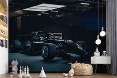 a living room with a black and white photo on the wall next to chess pieces