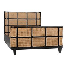 a black and brown bed frame with wicker panels