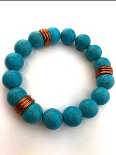 This bracelet is a true statement piece handmade with blue gemstone beads and copper accent pieces. Made to fit average 7" wrist. This listing comes with one bracelet. Choking Hazard. Keep out of reach of small children. Out Of Reach, Copper Accents, Blue Gemstones, Gemstone Bracelet, Accent Pieces, Statement Pieces, Gemstone Beads, Jewelry Bracelets, Beaded Bracelets