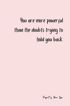 a pink background with the words you are more powerful than the doubt trying to hold you back