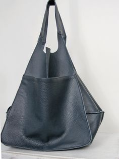 "Oversized Bag - Large Leather Tote Bag - XXL Handbag OVERSIZE STYLISH TOTE BAG made from high quality natural leather. Very roomy interior provides a lot of space for all the daily essentials and more. It is large enough to hold all your weekend essentials. This bag is a great option as your everyday bag. It can fit A4 files, books, magazines, cosmetic bag, accessories, your Macbook / Ipad and other electronic devides. Inside there are 2 pockets for mobile phone and another one with zipper for Modern Blue Soft Leather Hobo Bag, Blue Leather Weekender Bag With Large Capacity, Modern Blue Leather Hobo Bag, Blue Leather Rectangular Weekender Bag, Modern Blue Hobo Bag With Leather Handles, Versatile Blue Leather Hobo Bag, Blue Textured Leather Shoulder Bag For Everyday, Blue Everyday Shoulder Bag With Textured Leather, Blue Textured Leather Everyday Shoulder Bag