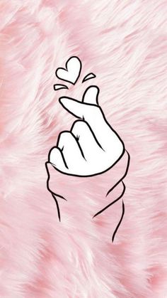 a drawing of a hand holding a heart in the middle of it's fingers