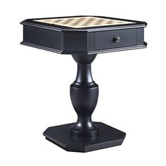 a black table with a chess board on it