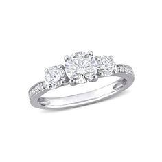 three stone engagement ring with diamonds on the shoulders and side stones set in 18k white gold